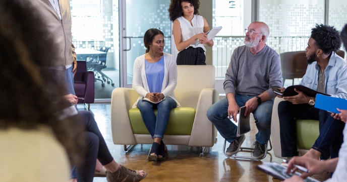 Professionals talking in a group