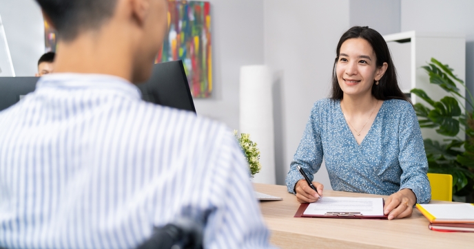 Two people in a meeting